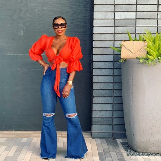 DISTRESSED FLARE JEANS