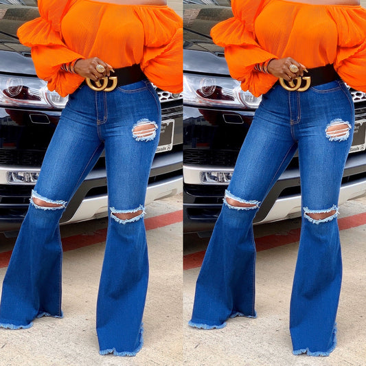 DISTRESSED FLARE JEANS